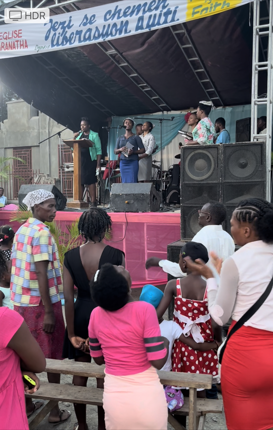 Worshippers on stage at a Freedom by Faith crusade